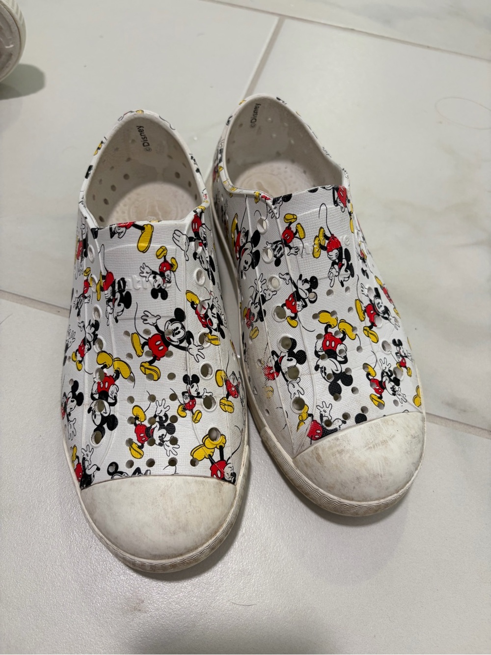 Native Shoes Kids White Mickey Mouse Slip-On Sneakers with Red & Yellow Accents